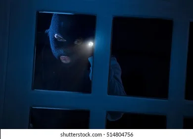 burglar-flashlight-looking-through-window-260nw-514804756 Burglar Flashlight Looking Through Window 260nw 514804756
