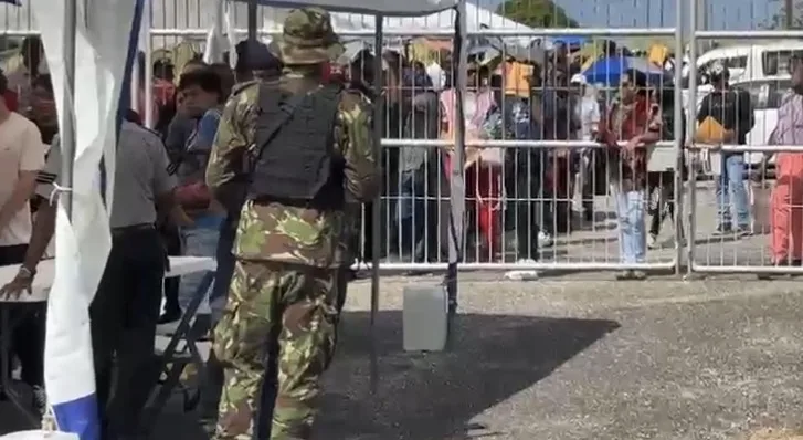 Verbal Clash Marks Migrant Registration Process Start