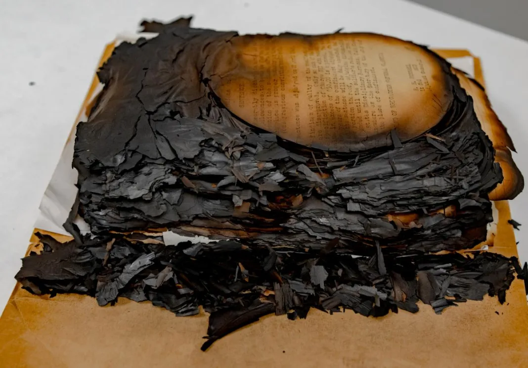 University Principal Burns Records Amid Property Dispute