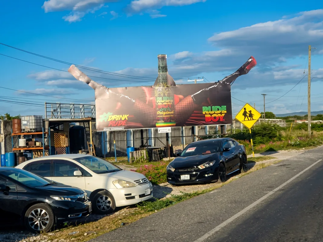 Rude Boy Billboard Ad Near School Crossing Sparks Controversy and Online Debate