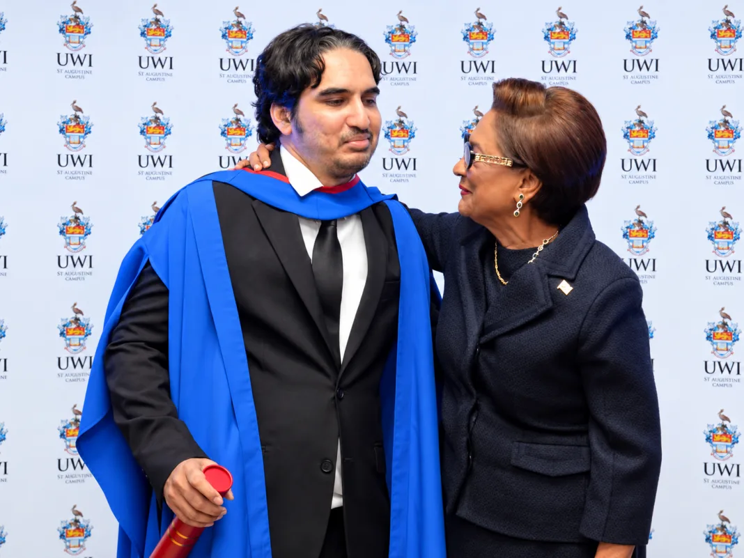 **Prime Minister Kamla Persad-Bissessar was a proud mother on Thursday as her on