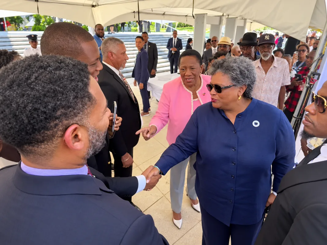 Mia Mottley Greets Opposition Members at Mighty Sparrow’s Funeral