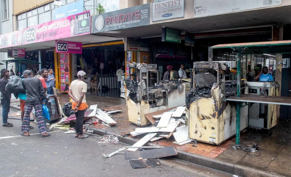 IN PICS: Fire damages Durban CBD printing shop after suspected petrol bomb attack