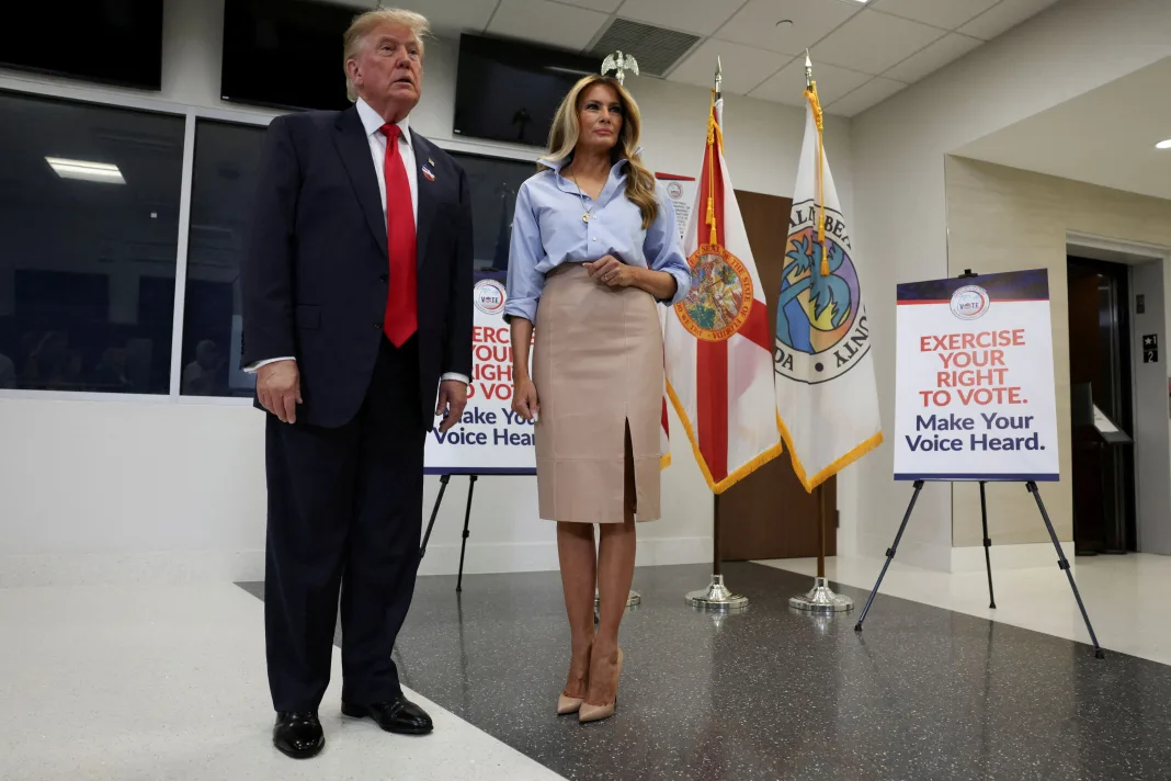 President Donald Trump speaks next to first lady Melania Trump after casting his ballot at the Palm Beach County Supervisor of Elections office, in the 2026 midterm elections in West Palm Beach, Florida, US, October 24, 2026. REUTERS/Umit Bektas REFILE - CORRECTING 